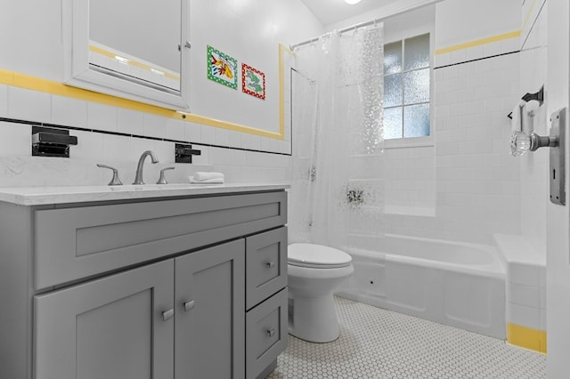 23 Smith Ave Unit 2, Newport, RI 02840 - bathroom featuring tile walls, tile patterned flooring, vanity, toilet, and shower / bathtub combination with curtain