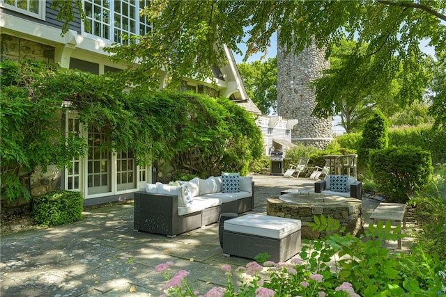 view of patio / terrace with grilling area and an outdoor living space
