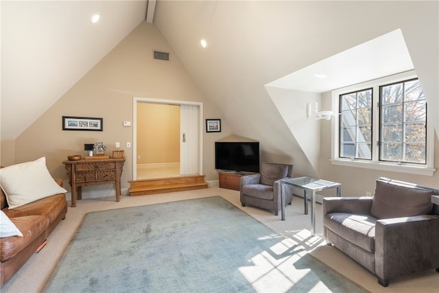 living area with lofted ceiling with beams, visible vents, and light carpet