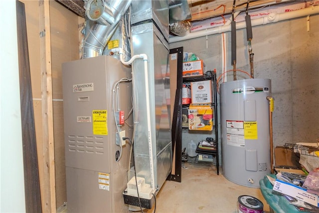 utility room featuring water heater