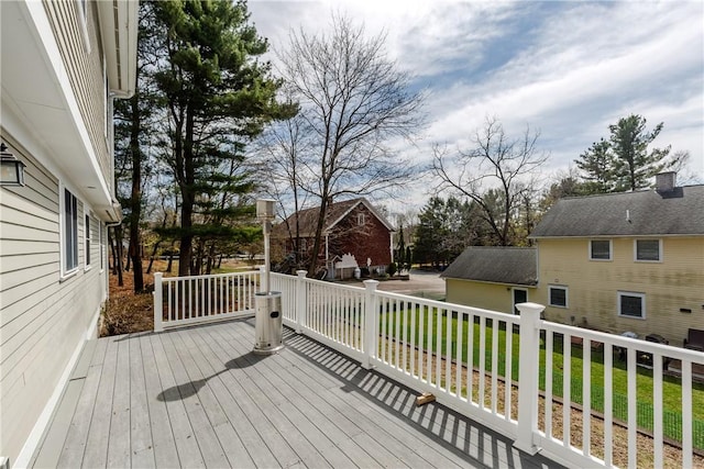 wooden deck with a yard