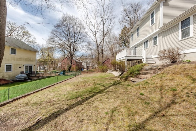 view of yard featuring a wooden deck