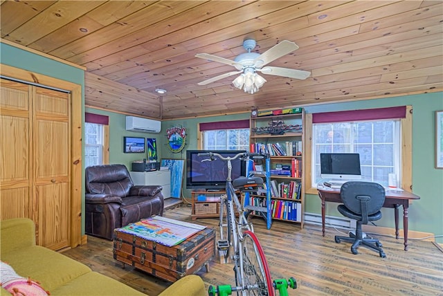 interior space with baseboards, wood finished floors, an AC wall unit, and wooden ceiling