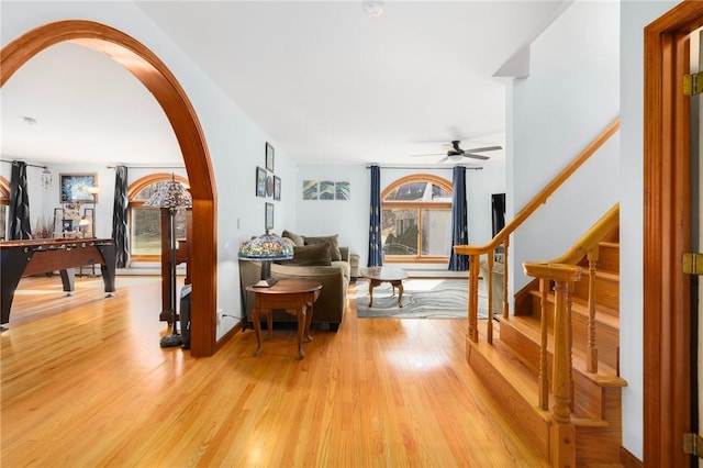 135 Eagleville Rd, Tiverton, RI 02878 - hall featuring plenty of natural light, arched walkways, and light wood-style flooring