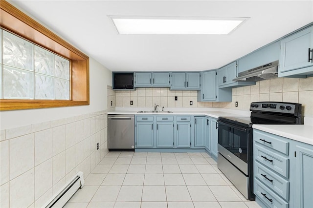 135 Eagleville Rd, Tiverton, RI 02878 - kitchen featuring appliances with stainless steel finishes, under cabinet range hood, blue cabinets, baseboard heating, and a sink