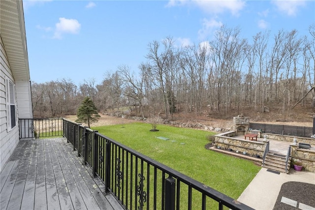 135 Eagleville Rd, Tiverton, RI 02878 - wooden deck with an outdoor stone fireplace and a yard