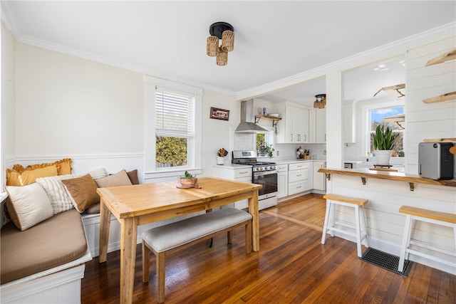 4588 Main Rd, Tiverton, RI 02878 - dining room with hardwood / wood-style flooring and crown molding