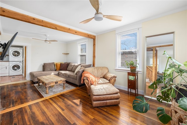 4588 Main Rd, Tiverton, RI 02878 - living area with ornamental molding, stacked washer / dryer, a ceiling fan, and hardwood / wood-style flooring