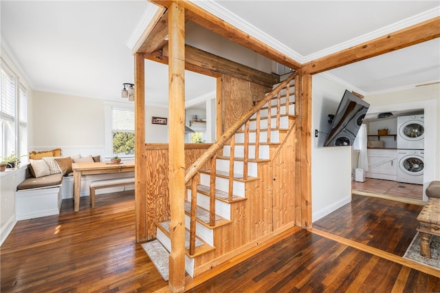 4588 Main Rd, Tiverton, RI 02878 - stairway with ornamental molding, stacked washer / dryer, and wood-type flooring