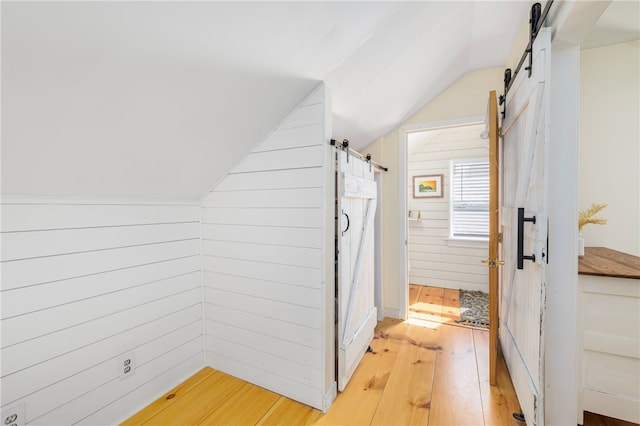 4588 Main Rd, Tiverton, RI 02878 - bathroom with hardwood / wood-style floors, wood walls, and lofted ceiling