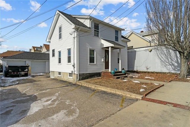 traditional-style house with an outbuilding