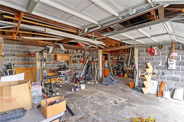 garage with concrete block wall