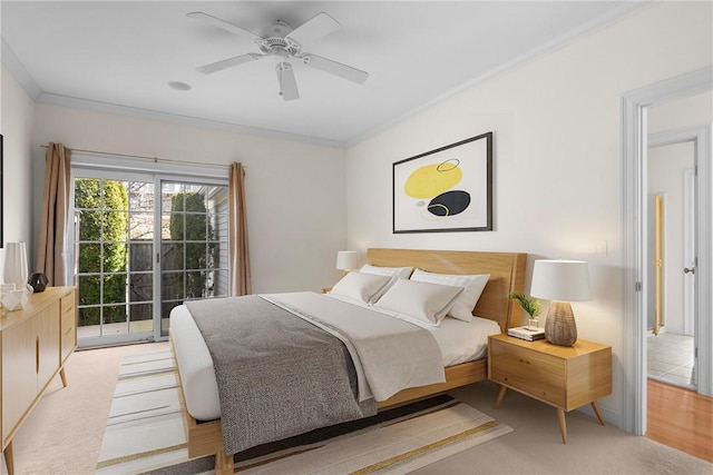 bedroom featuring ceiling fan and crown molding