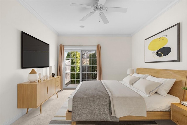 bedroom featuring access to exterior, crown molding, light carpet, baseboards, and ceiling fan