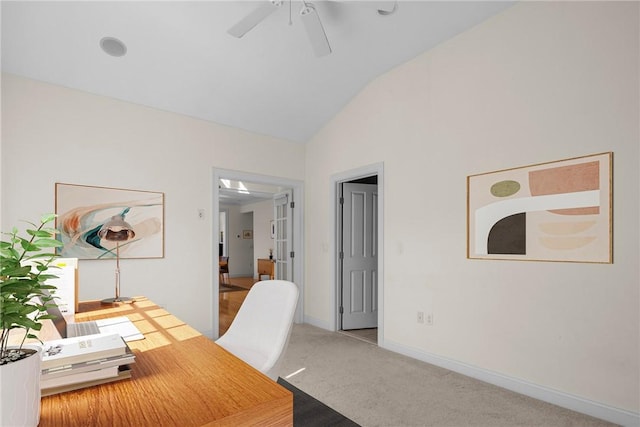 carpeted office with baseboards, lofted ceiling, and ceiling fan
