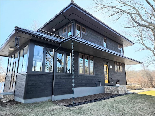 17 Jamaica Way N, Kingstown, RI 02852 - view of side of property featuring a sunroom