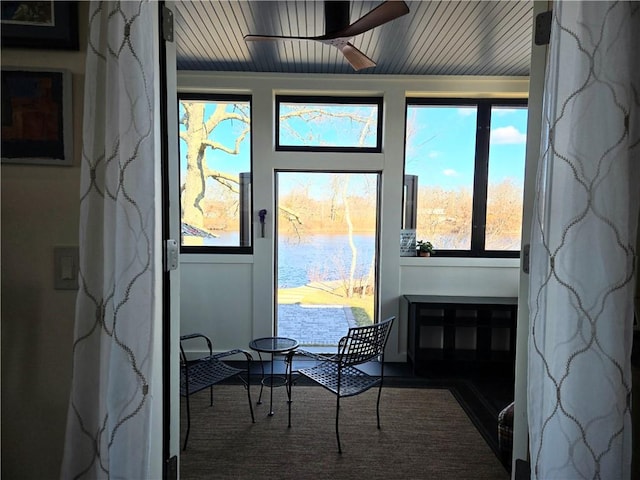 entryway featuring ceiling fan and wood ceiling
