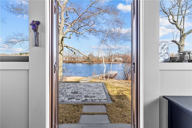 entryway with a water view