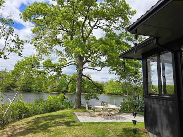 17 Jamaica Way N, Kingstown, RI 02852 - view of grassy yard with a patio and a water view