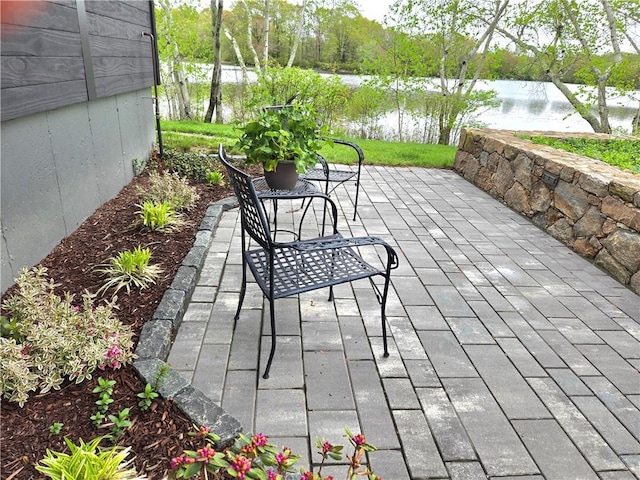 17 Jamaica Way N, Kingstown, RI 02852 - view of patio / terrace with a water view