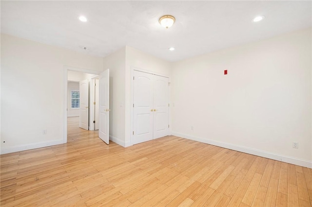 982 Plainfield St Unit 4, Johnston, RI 02919 - unfurnished room featuring baseboards, light wood finished floors, and recessed lighting