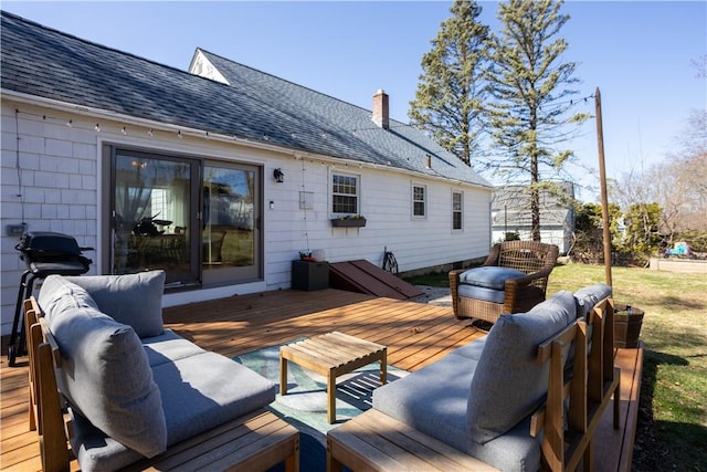wooden deck featuring outdoor lounge area
