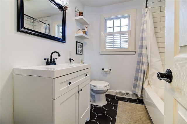 full bathroom with vanity, baseboards, tile patterned flooring, toilet, and visible vents