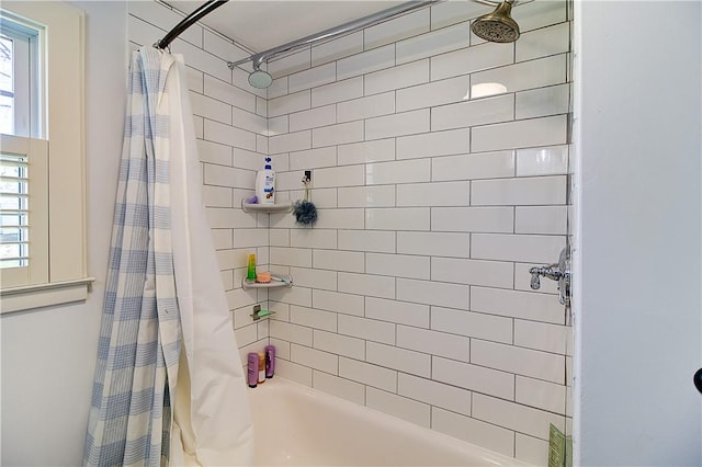 full bathroom with shower / bath combo
