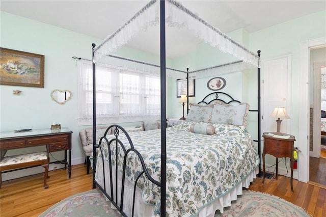 55 Hunter Ave, Newport, RI 02840 - bedroom featuring baseboards and wood finished floors
