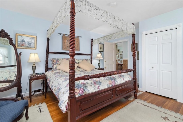 55 Hunter Ave, Newport, RI 02840 - bedroom featuring a closet, baseboards, and wood finished floors
