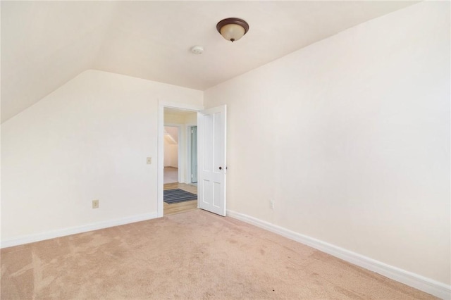 55 Hunter Ave, Newport, RI 02840 - carpeted spare room featuring baseboards and vaulted ceiling