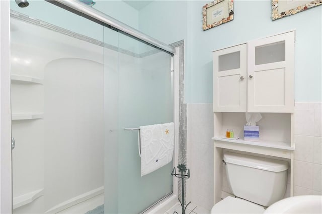 55 Hunter Ave, Newport, RI 02840 - bathroom featuring tile walls, toilet, and a shower stall