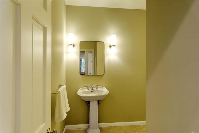 bathroom featuring tile patterned floors and baseboards