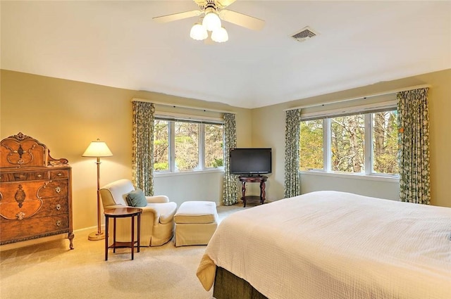 bedroom with visible vents, carpet, ceiling fan, and baseboards