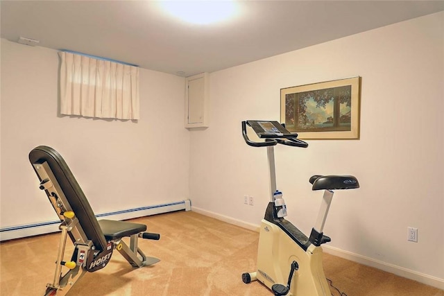 exercise room featuring baseboards, a baseboard heating unit, and light carpet