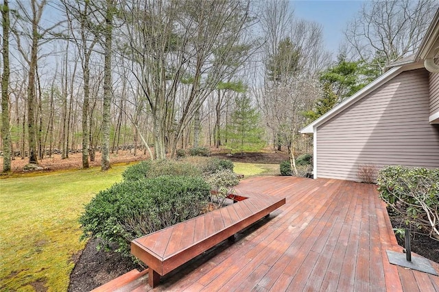 wooden deck with a yard