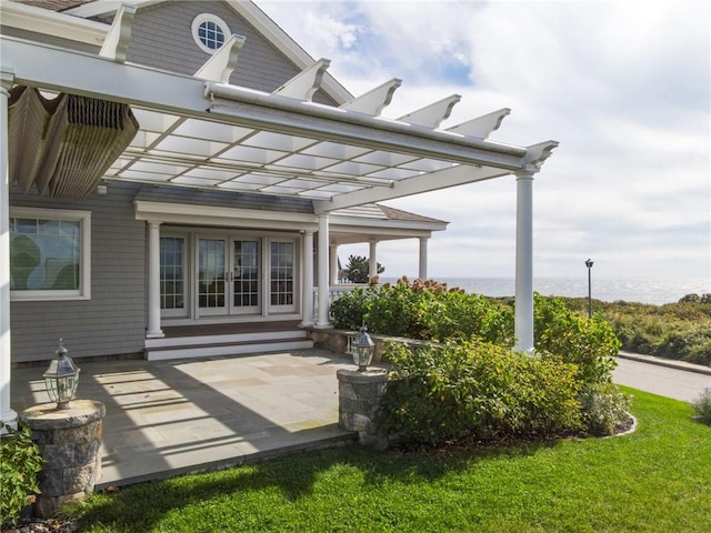 7 Fenway Rd, Westerly, RI 02891 - back of property featuring a pergola and french doors
