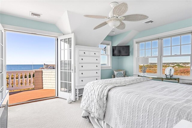 7 Fenway Rd, Westerly, RI 02891 - carpeted bedroom featuring vaulted ceiling, visible vents, a water view, and access to exterior