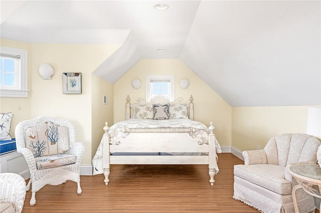 7 Fenway Rd, Westerly, RI 02891 - bedroom with vaulted ceiling, wood finished floors, and baseboards