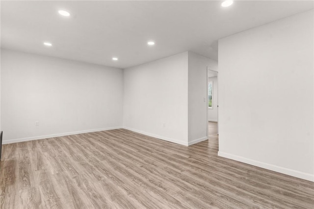 5 Cottage St, Westerly, RI 02891 - empty room with light wood finished floors, baseboards, and recessed lighting