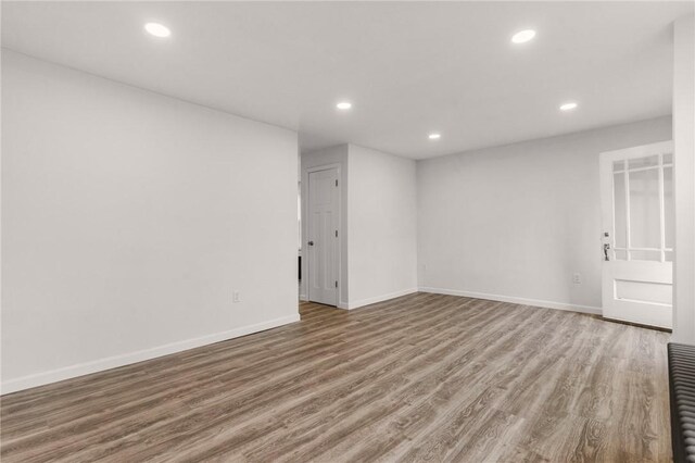 5 Cottage St, Westerly, RI 02891 - empty room with baseboards, recessed lighting, and wood finished floors