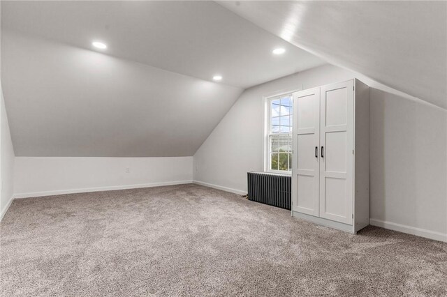 5 Cottage St, Westerly, RI 02891 - bonus room with carpet floors, baseboards, and radiator