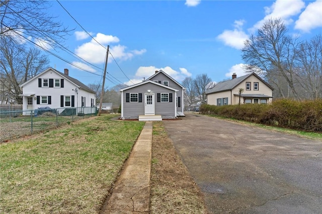 5 Cottage St, Westerly, RI 02891 - bungalow-style house featuring aphalt driveway, a front yard, and fence