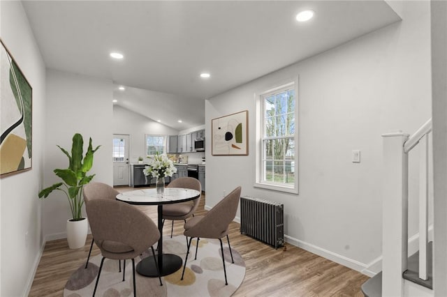 5 Cottage St, Westerly, RI 02891 - dining room featuring light wood finished floors, radiator heating unit, and recessed lighting