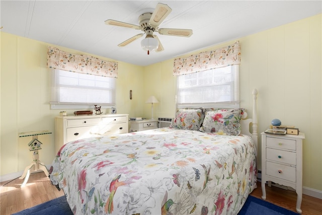 27 Woodward Rd, Lincoln, RI 02865 - bedroom featuring ceiling fan, wood finished floors, and multiple windows