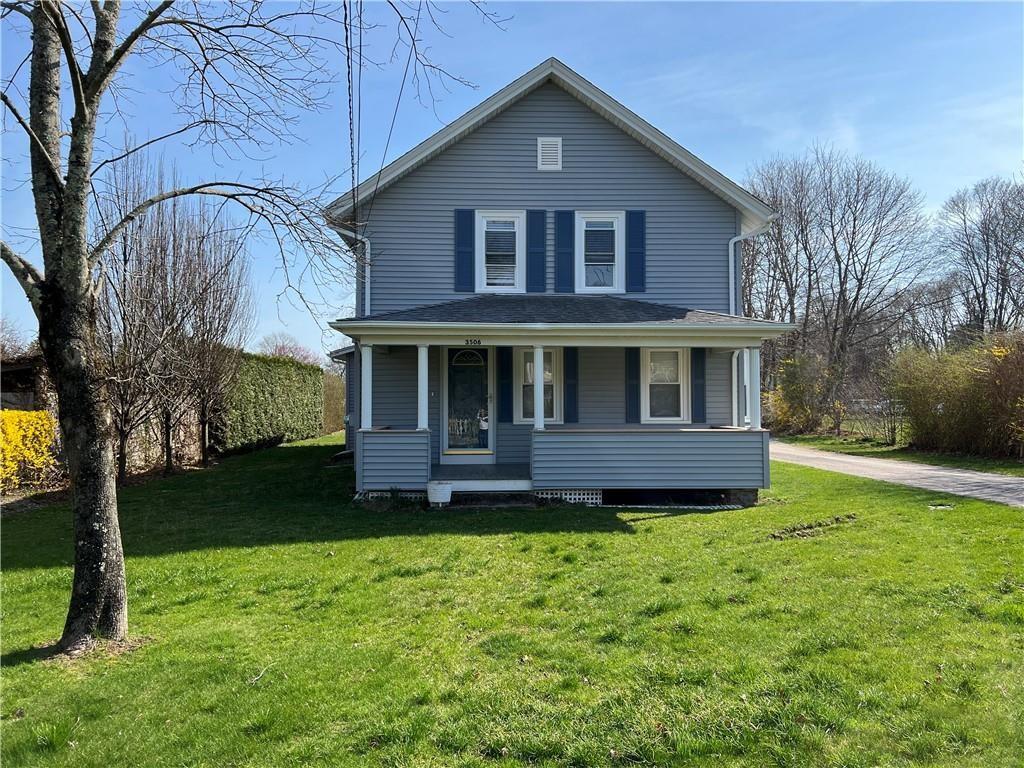 3506 Kingstown Rd, South Kingstown, RI 02892 - view of front facade featuring a porch and a front lawn