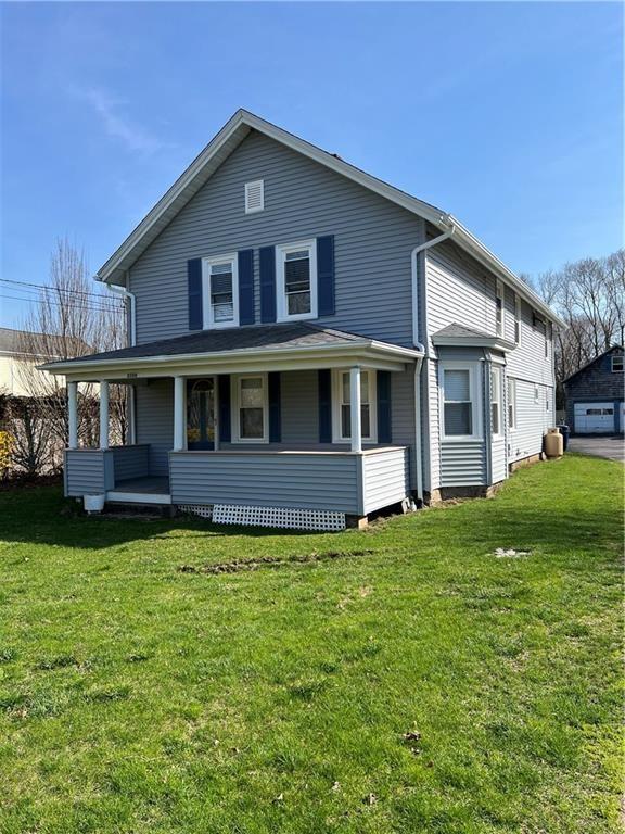 3506 Kingstown Rd, South Kingstown, RI 02892 - view of front of home featuring a front yard and a porch