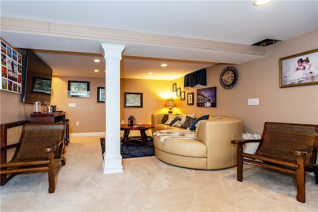 living room featuring baseboards, ornate columns, light colored carpet, and recessed lighting