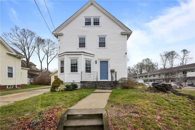 view of front of house featuring a front yard