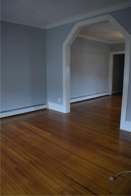 186 Camp St Unit 5, Providence, RI 02906 - empty room featuring a baseboard radiator, wood finished floors, and ornamental molding
